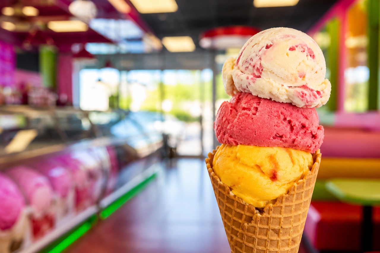three scoops of Mexican ice cream in a waffle cone at La Michoacana AZ